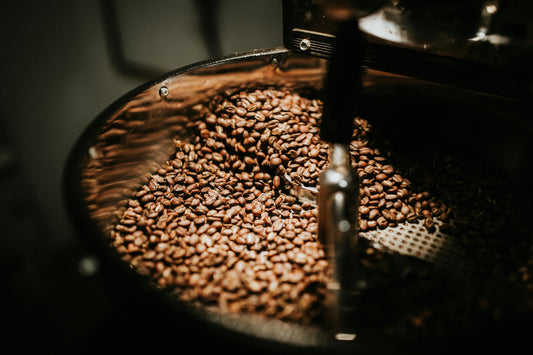 specialty coffee being roasted in a small commercial roaster